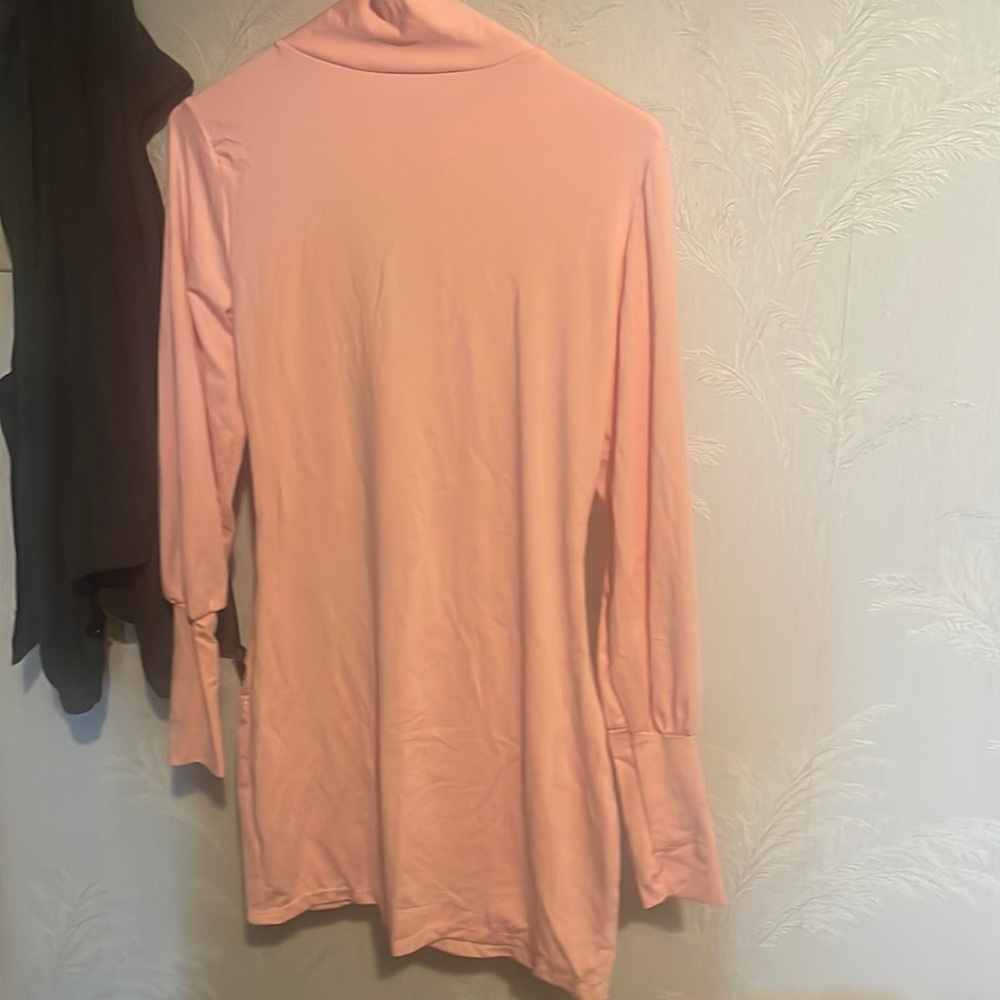 Light pink long sleeves with a peekaboo back